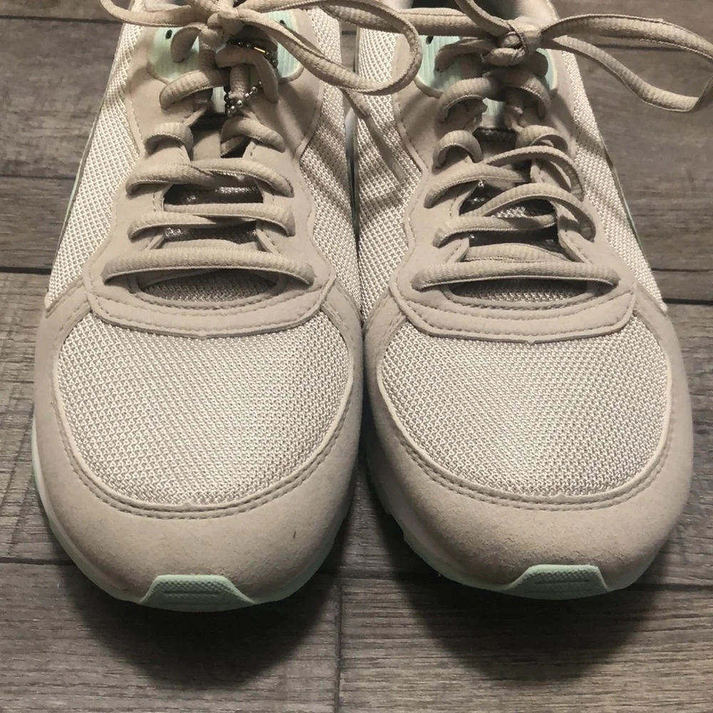 Puma retro runner sneakers in mint and light grey with soft foam support inserts